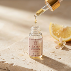 halo skin the glow serum dripping into the bottle vitamin c bakuchiol sample bottle